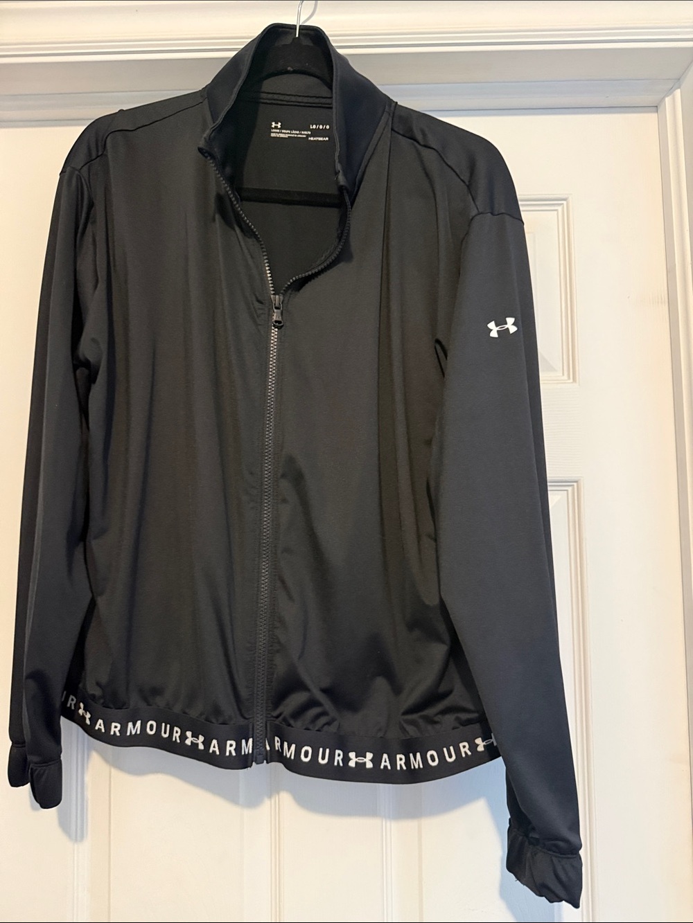 Under Armour loose jacket size large new without tags.